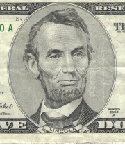 A portrait of Lincoln as seen on the U.S. five dollar bill.
